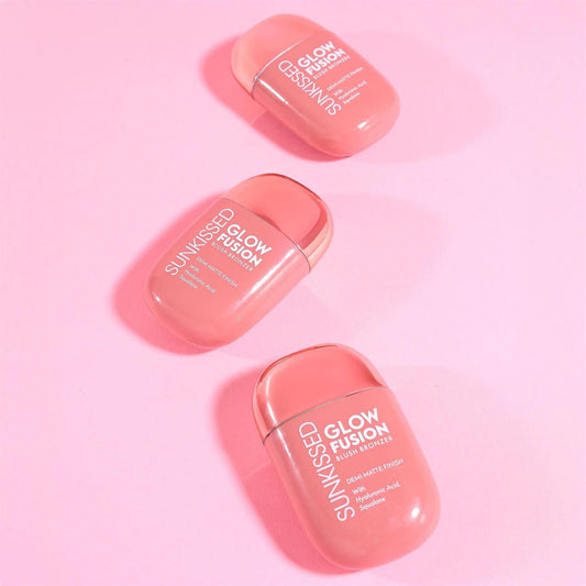 Sunkissed Glow Fusion Blush Bronzer flat lay group arrangement on pink background