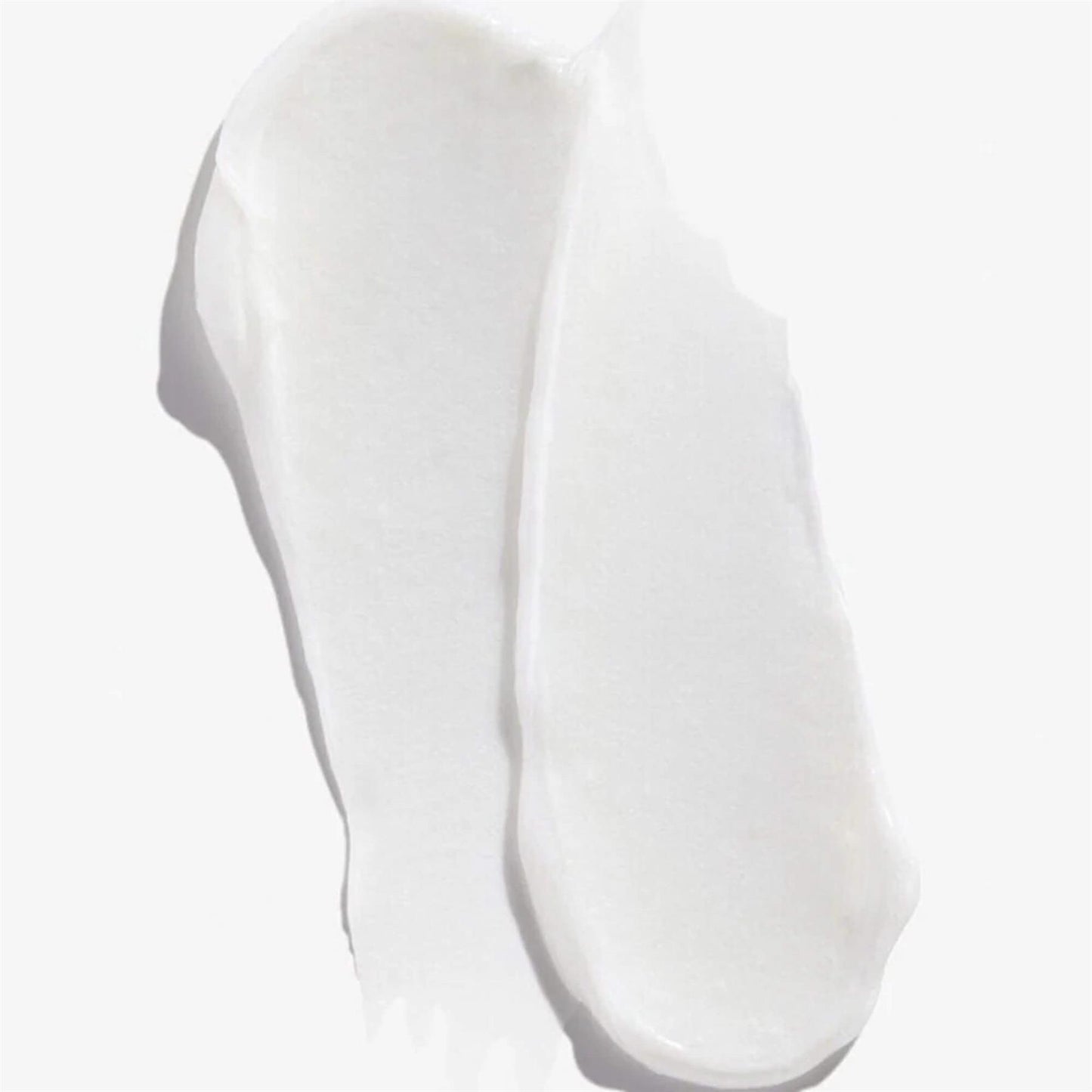 Texture swatch of Redken Acidic Bonding Concentrate Conditioner showing a thick and creamy white consistency