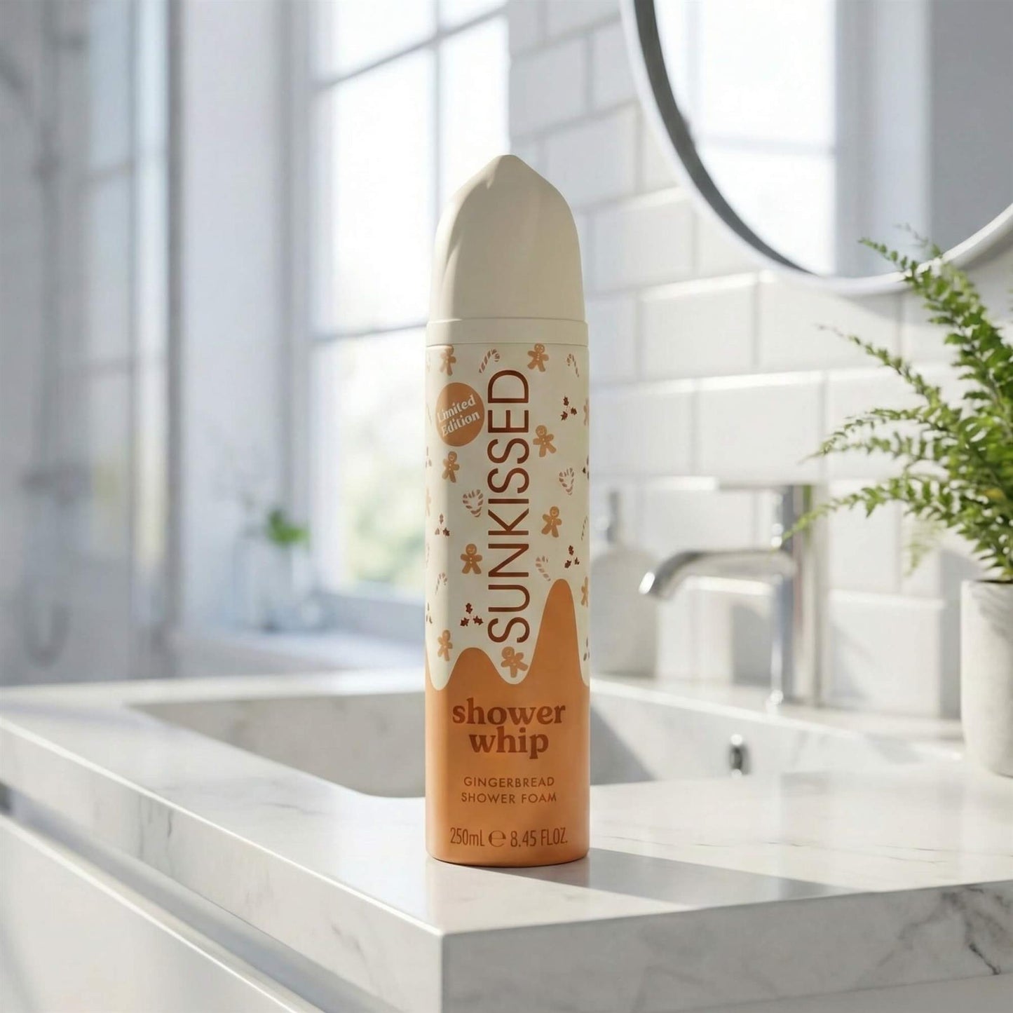 Limited Edition Sunkissed Gingerbread Shower Whip 250ml foam bottle on a white marble bathroom sink